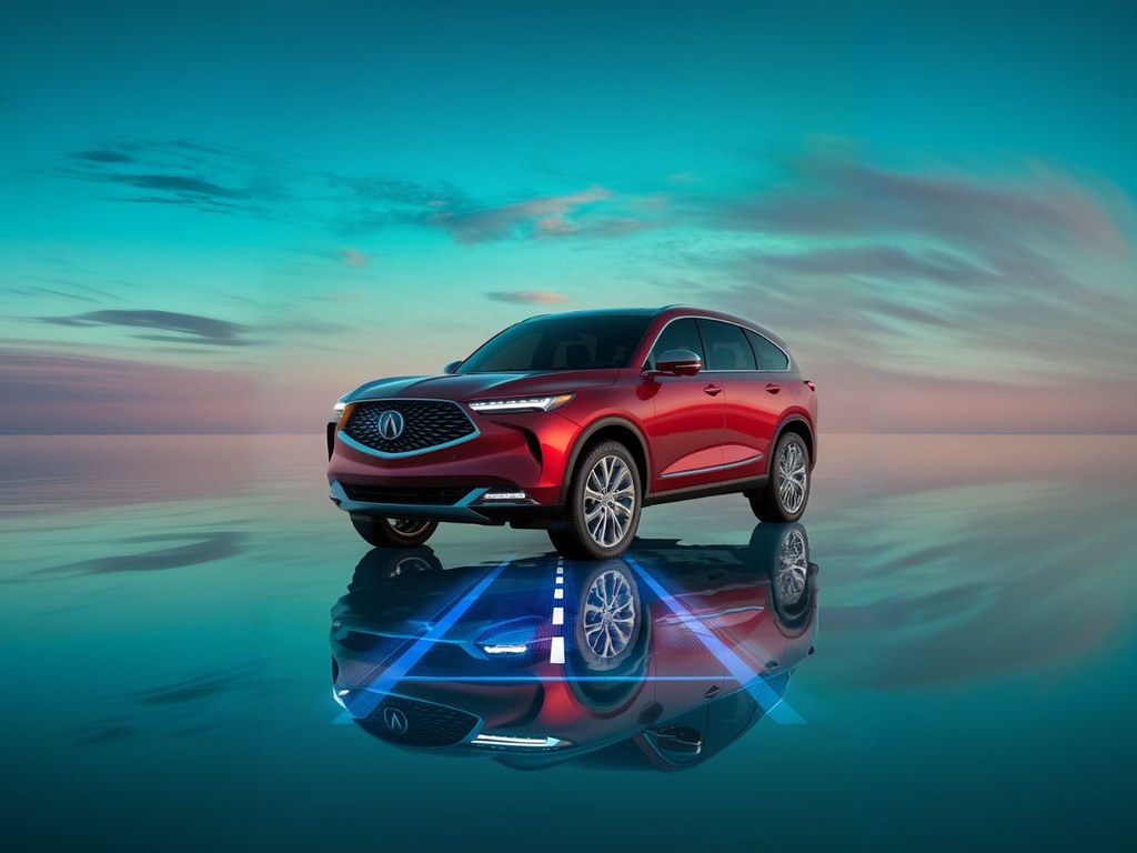 Red-Acura-suv-showing-the-ADAS-system-from-below