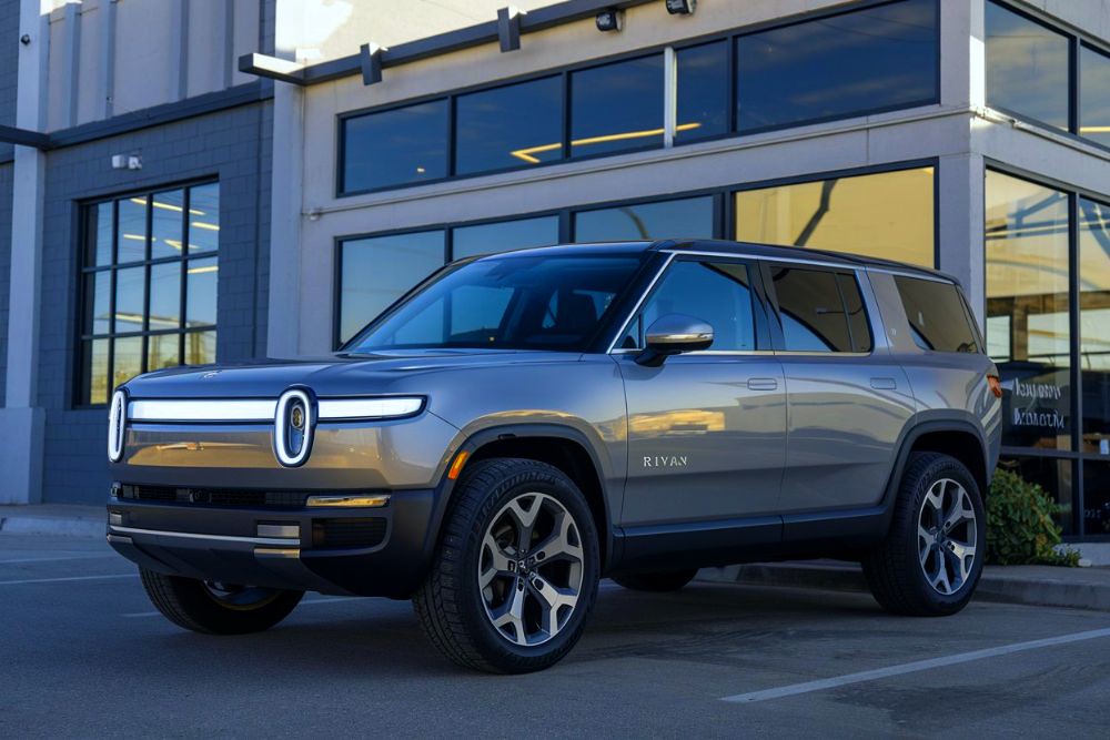 Rivian-parked-in-front-of-body-shop-Rivian-Certified-Collision-Repair-Precision-Body-and-Paint